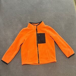 Zip up jacket/sweater.